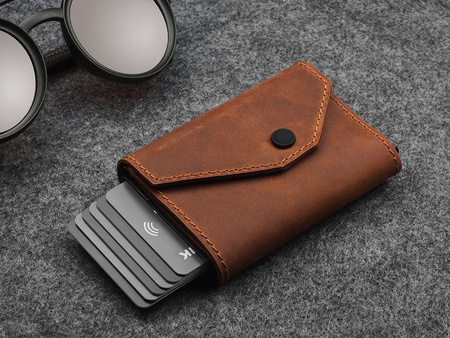 Portfel PORTER Go wykonany z woskowanej skóry Hunter koniak