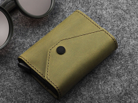 Portfel PORTER Go wykonany z woskowanej skóry Hunter oliwkowy