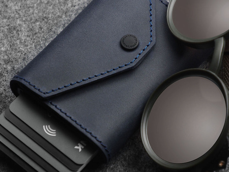 Portfel PORTER Go wykonany z woskowanej skóry Hunter granatowy