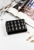 Kompaktowy portfel damski w typie piórnika w czarnym kolorze - Rovicky