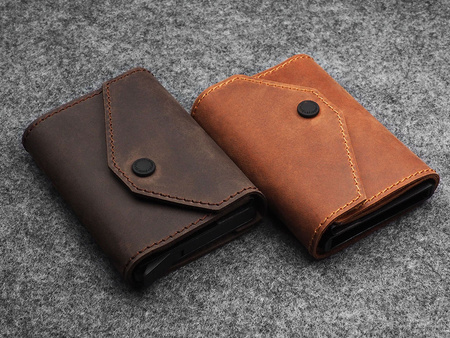 Portfel PORTER Go wykonany z woskowanej skóry Hunter brązowy