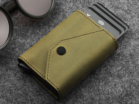 Portfel PORTER Go wykonany z woskowanej skóry Hunter oliwkowy