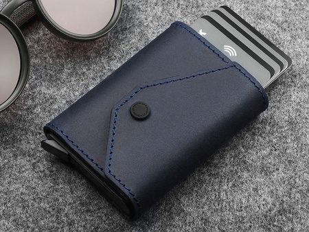 Portfel PORTER Go wykonany z woskowanej skóry Hunter granatowy