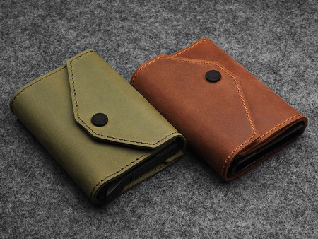 Portfel PORTER Go wykonany z woskowanej skóry Hunter oliwkowy