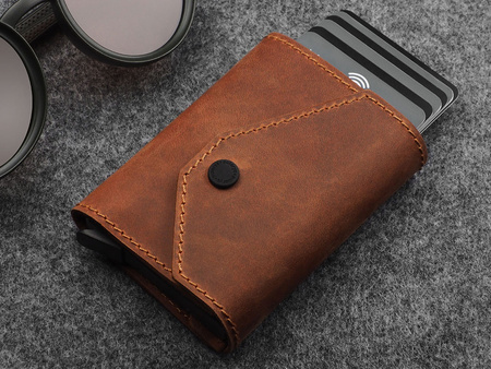 Portfel PORTER Go wykonany z woskowanej skóry Hunter koniak