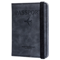 Czarne etui na paszport ze skóry ekologicznej zamykane gumką - Peterson